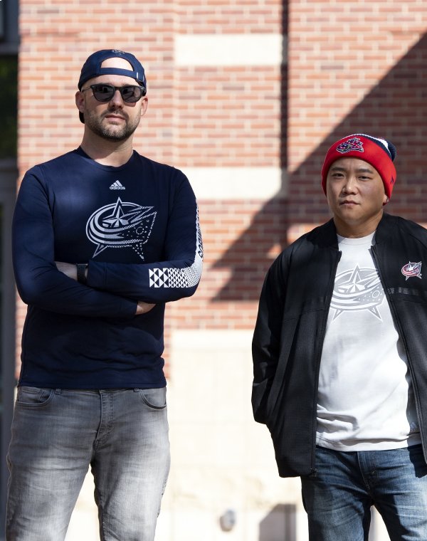 Man wearing Columbus Blue Jacket hat and other gear