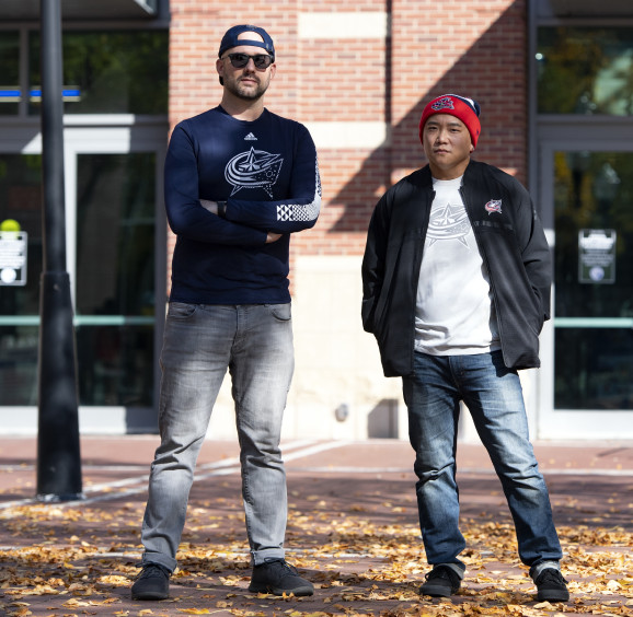 Man wearing Columbus Blue Jacket hat and other gear